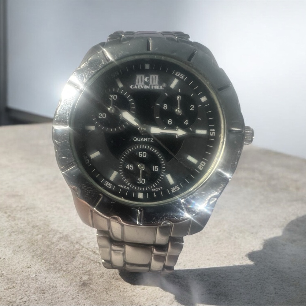 (954)Vintage Calvin Hill Silver and Black Quartz Watch…